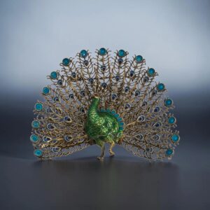 Spilla vintage  raffigurante Pavone smaltato in argento 800